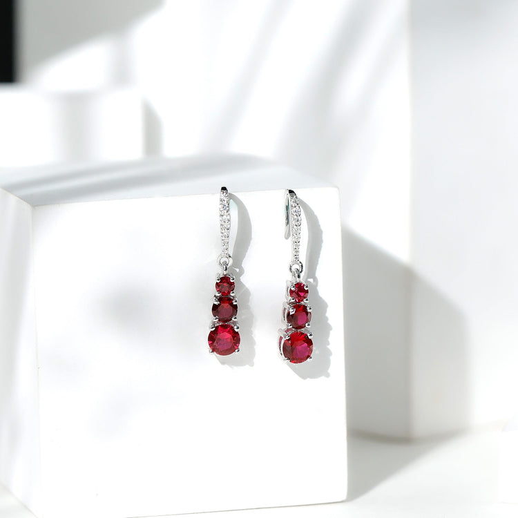 Certified Lab Created Ruby Three Stone Dangle Earrings with Moissanite Rosec Jewels